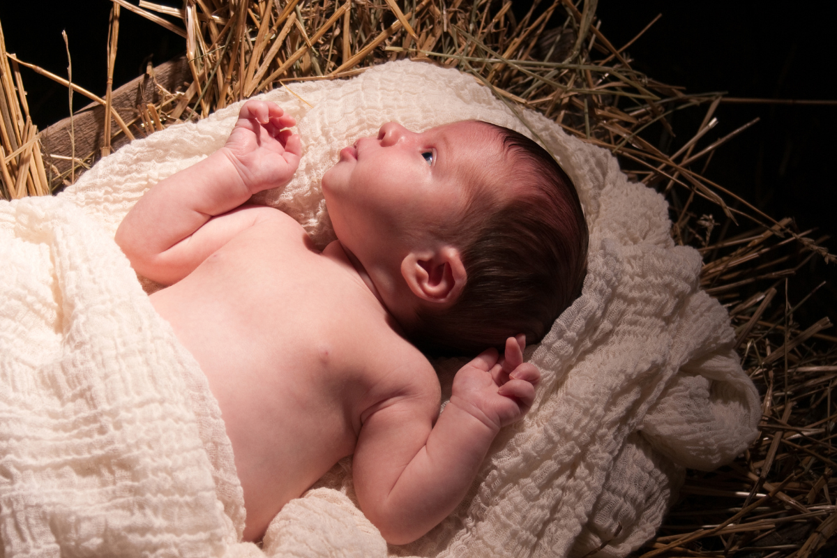 Picture of a baby in a manger